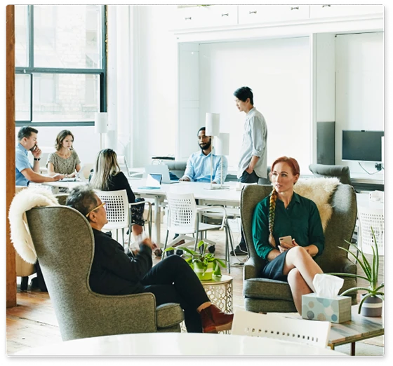 woman sitting in chair in conversation